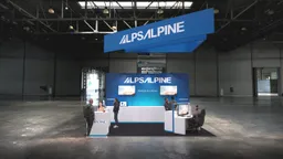 20x20 Island booth design by Reaction Space